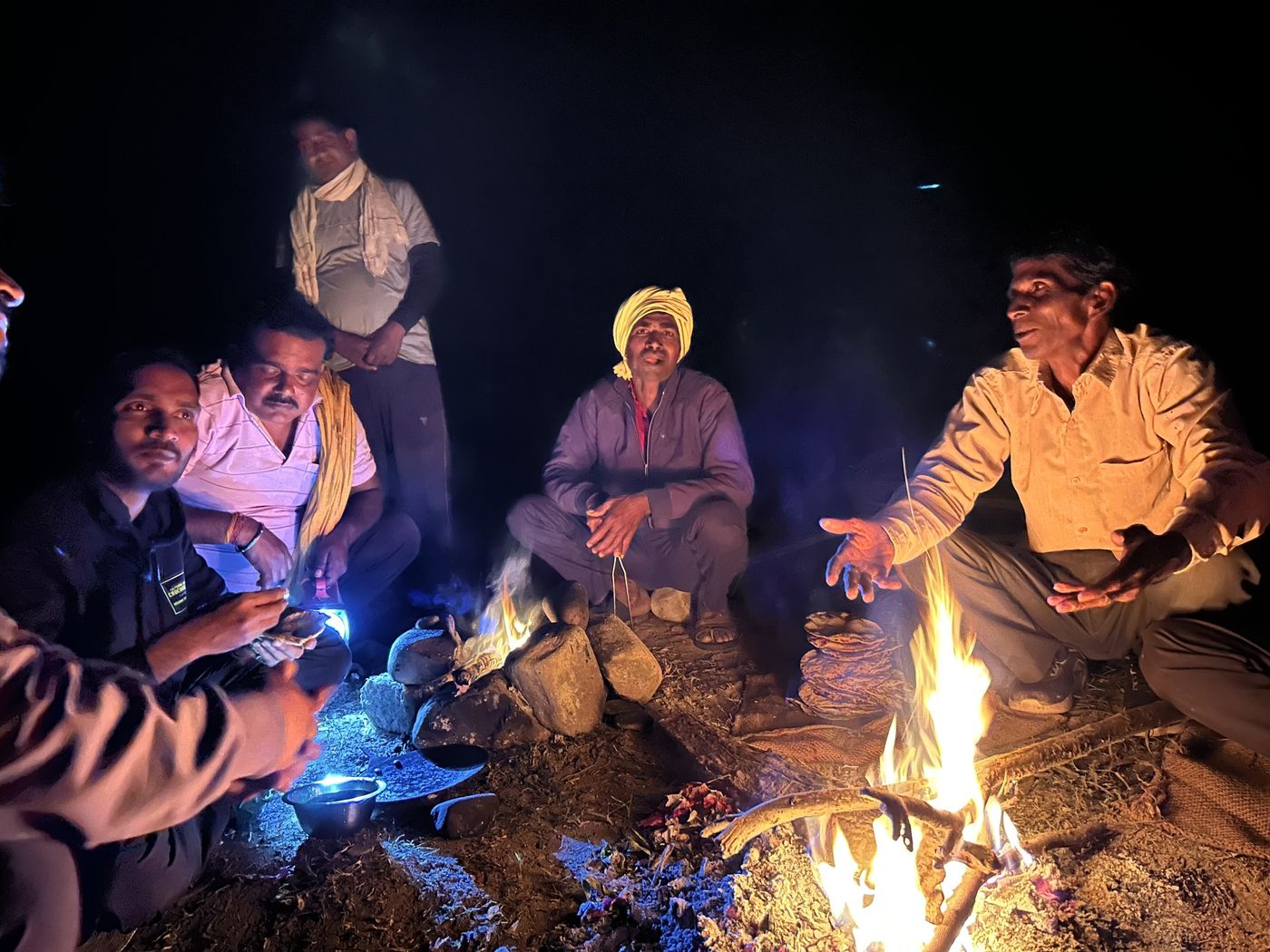Campfires are an excellent setting for team debriefs during our winter sessions of catching and tagging gharials.